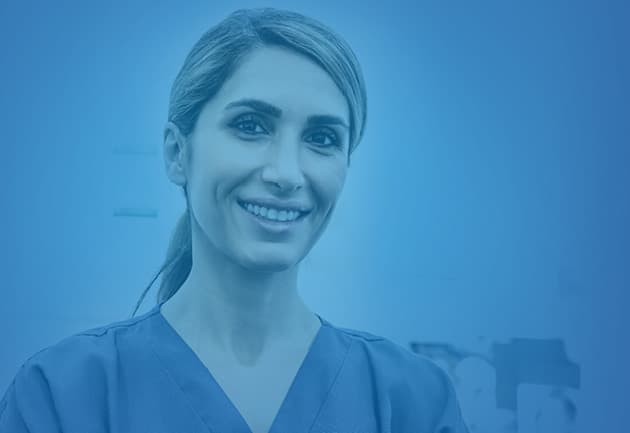 Business Advice Web Appetiser Ad 630X433px A female dentist wearing scrubs smiling into the camera