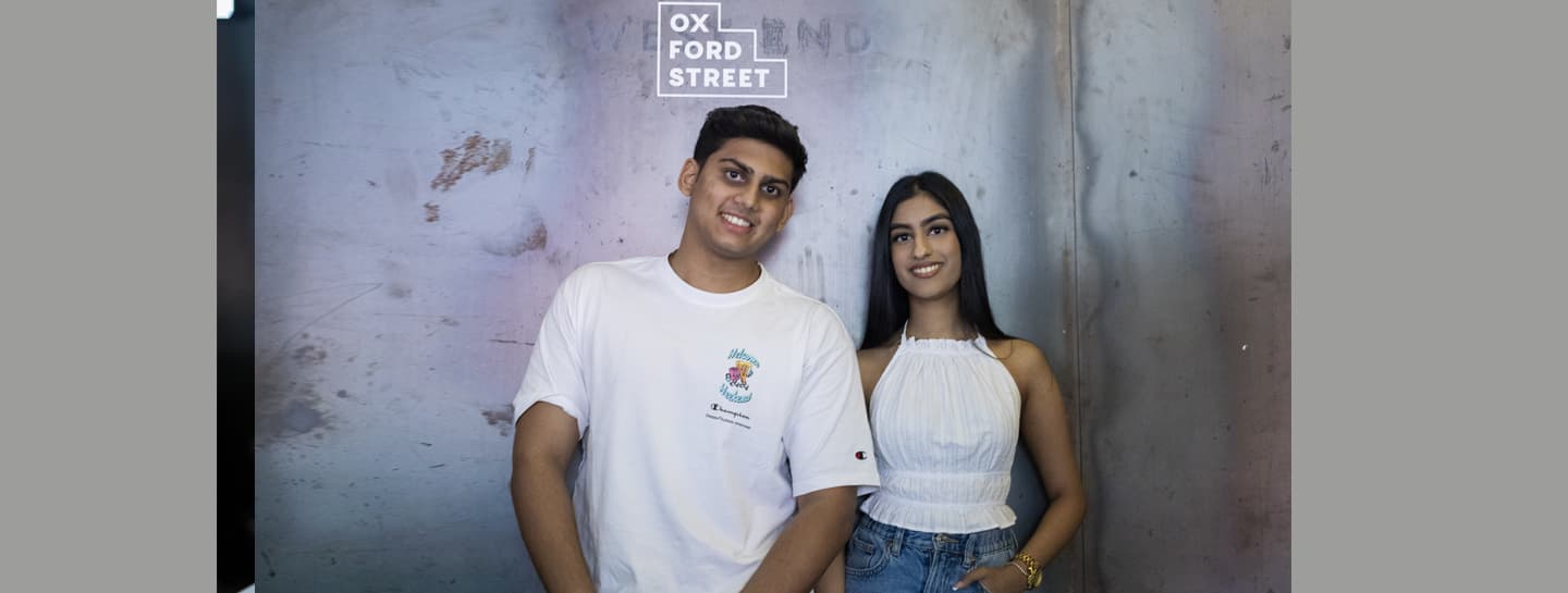 SECONDARY Hero 1440X545px CAREER ADVICE A male and female dental student smiling toward the camera