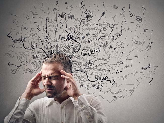 Tackling stress Tackling stress; man overwhelmed by information